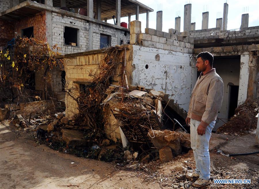 SYRIA-ZABADANI-WAR-RAVAGED CITY-FAMILIES-RETURNING