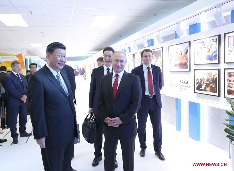 RUSSIA-VLADIVOSTOK-XI JINPING-PUTIN-PHOTO EXHIBITION