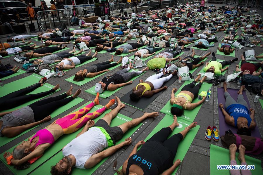 U.S.-NEW YORK-TIMES SQUARE-YOGA