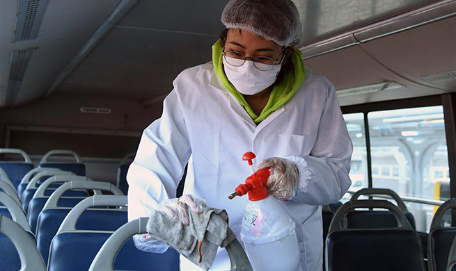 Prevention measures taken on buses to curb spread of coronavirus in Beijing